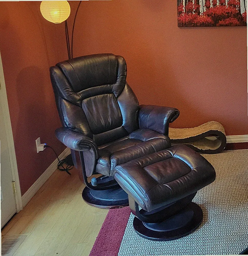 leather recliner with ottoman, swivels, excellent condition.